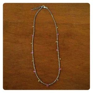 Gold, purple, and silver necklace